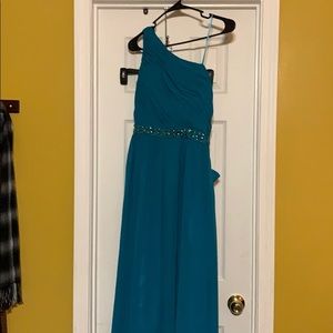 One strapped formal gown